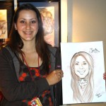 a girl holding her caricature
