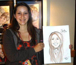 a girl holding her caricature