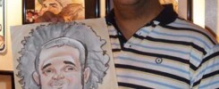 A guy holding his caricature