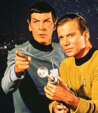 A photo of Captain Kirk and Mr. Spock pointing a super-old phaser at something.
