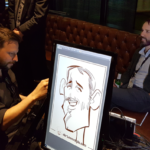 Sit back, relax, and have your digital caricature drawn.