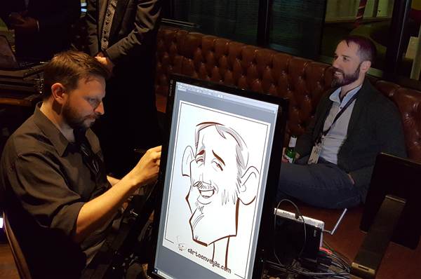 Sit back, relax, and have your digital caricature drawn.